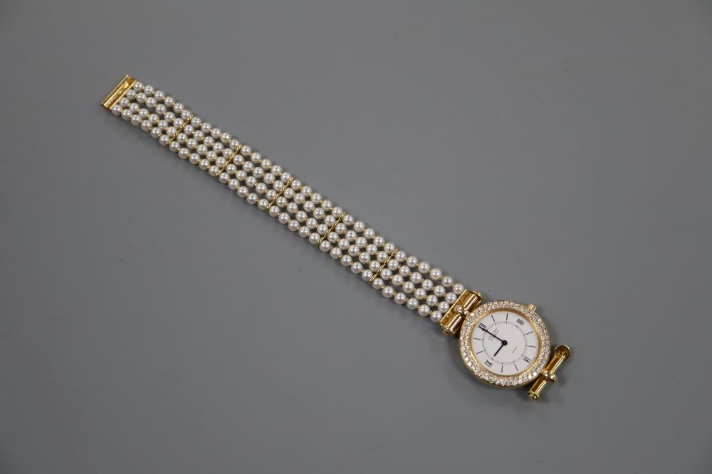 A ladys 18ct gold, seed pearl and diamond set Van Cleef and Arpels quartz bracelet watch, 17.5cm, gross 40 grams.